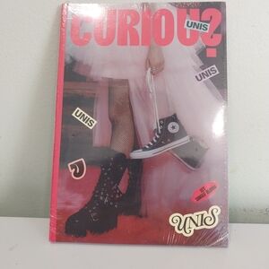 Curious? UNIS Magazine with Pink and Black Cover
